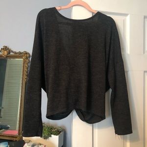 Charcoal sweater with a wrapped, low back